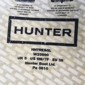 Woman’s tall hunter rain boots